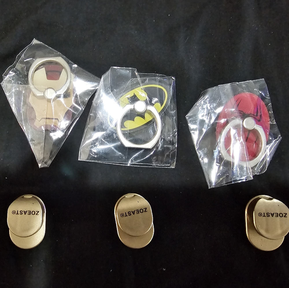 New in box marvel/ DC ring stands for phone